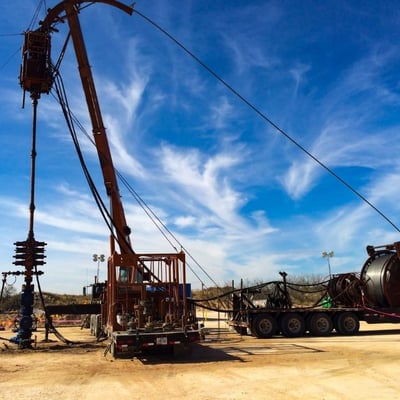 a workover rig installs coiled tubing on a failed well