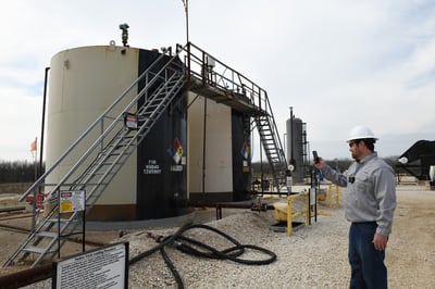 installing wireless tank level sensors on oil production tanks